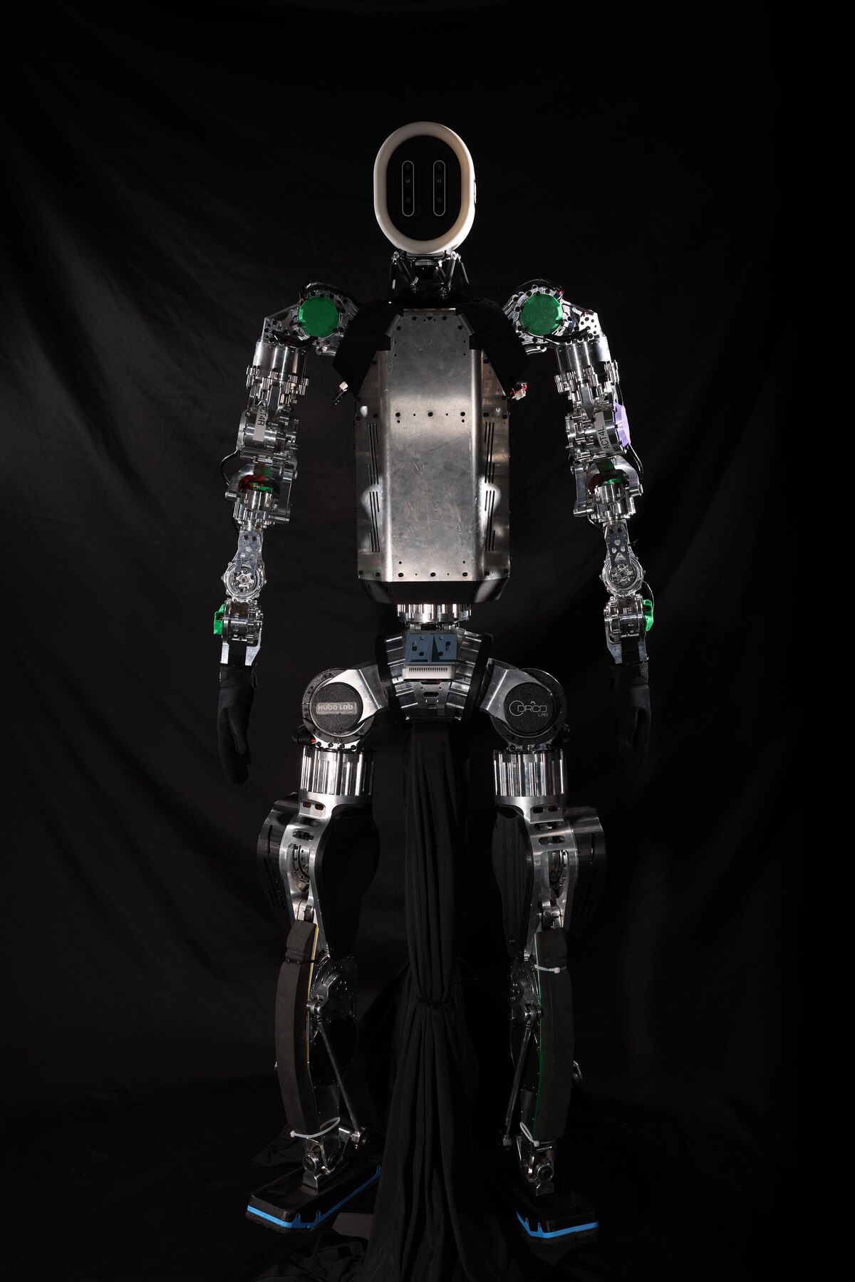 KAIST humanoid robot photographed against a black backdrop